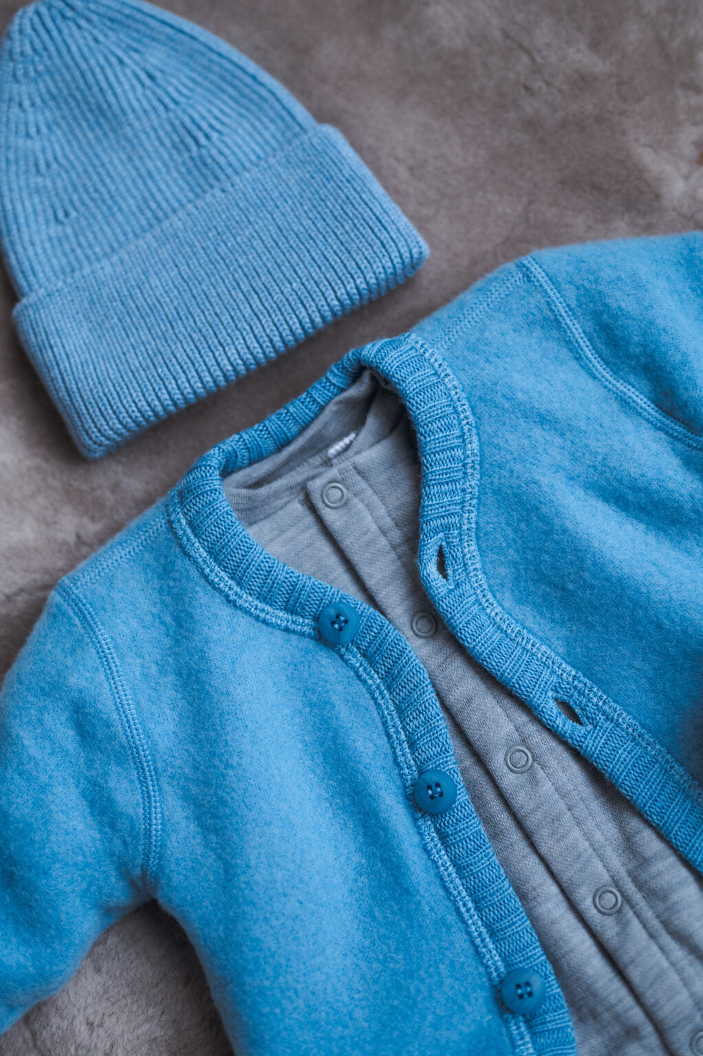 Joha wollen jumpsuit met omslag voetjes - Grijs